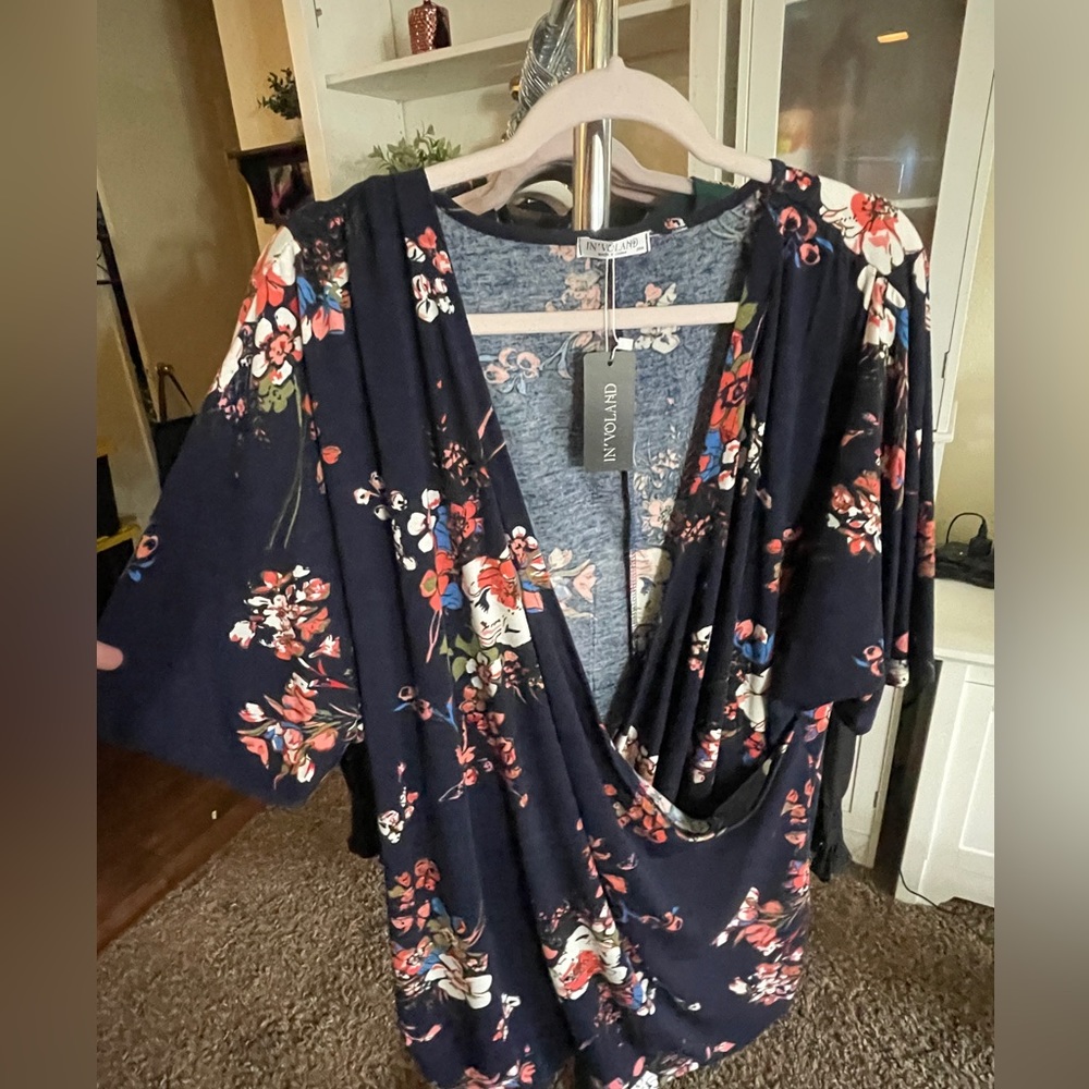 Brand new wrap, style shirt in a size size 26
